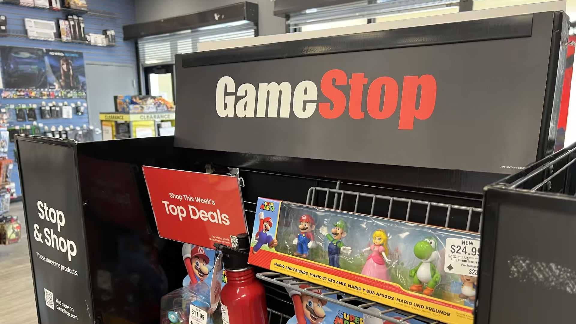 GameStop store display shelf with Mario