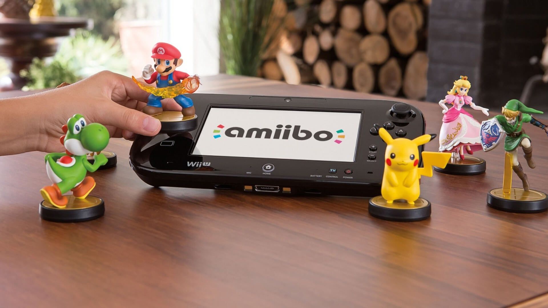 A player applying a Mario amiibo to the Gamepad of the Nintendo Wii U, which has now been surpassed in UK sales by the Nintendo Switch 2